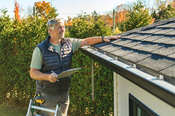 Professional Roofing technician working in Chrisman, IL